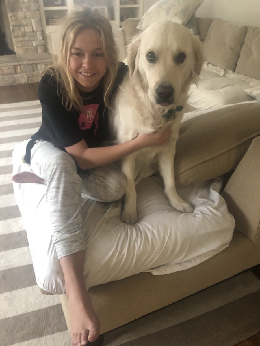 Complete original photograph of Callie sitting beside her human on a couch, from Steve Quirk's March 14, 2020 post